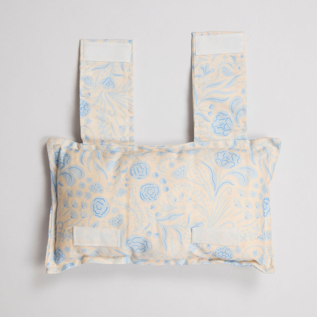 Port pillow with blue floral pattern on light background